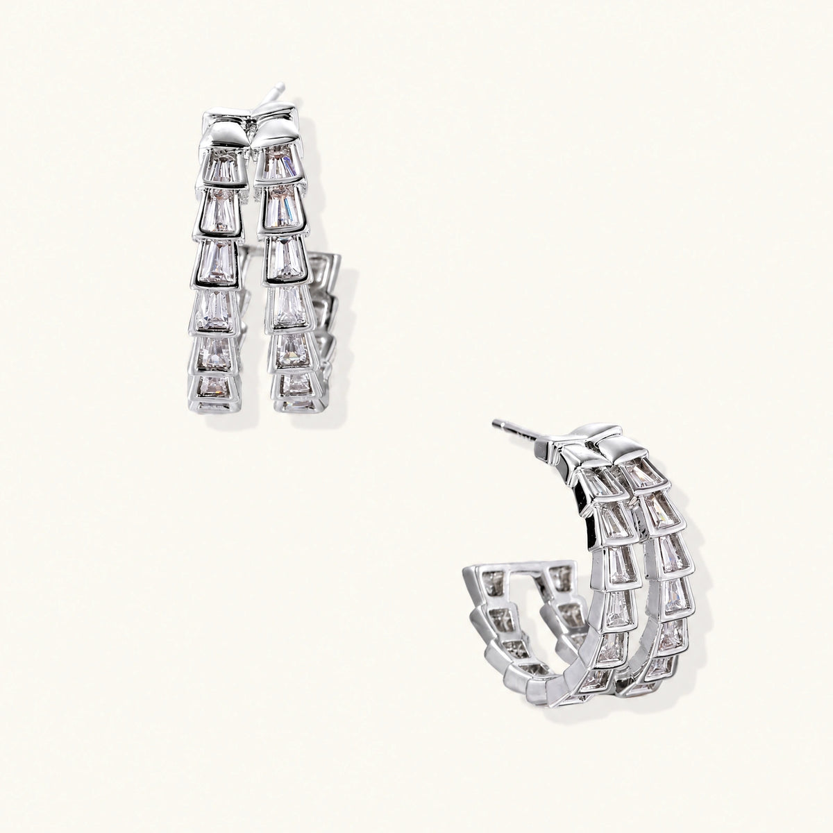 White gold-plated hoop earrings with double row of baguette-cut zirconia stones in geometric ladder design