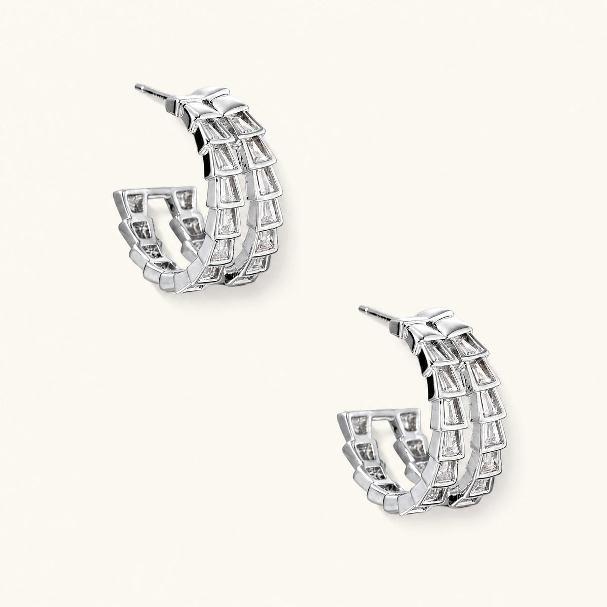 White gold-plated hoop earrings with double row of baguette-cut zirconia stones in geometric ladder design