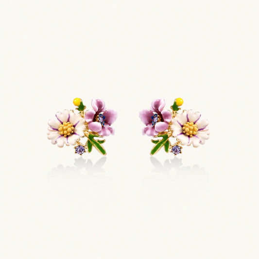 Cluster-style stud earrings with purple pansies, white daisies, yellow centers, and green leaves in glossy enamel finish