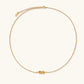 Dainty 18K gold plated necklace with infinity knot pendant on delicate chain against white background