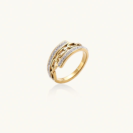 Gold-plated stainless steel ring with geometric chain link design flanked by two rows of clear rhinestones